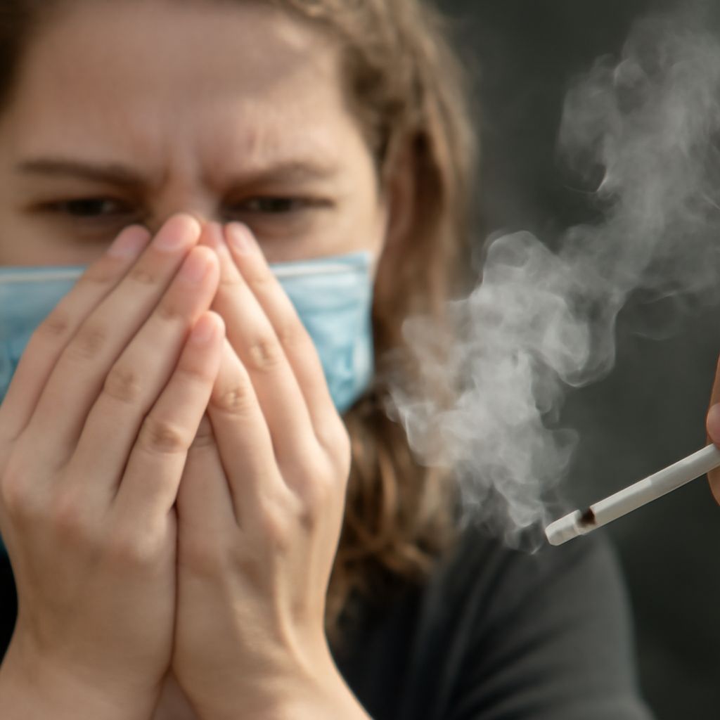 Cleaning smoke residue from walls and soft furnishings during whole-house odor removal